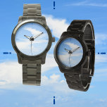 Blauwe lucht wervelende witte wolk fotografisch horloge<br><div class="desc">Een helderblauwe lucht met een werveling van witte wolken is een tijdige herinnering dat de Sky de limiet is op dit unieke blauw-witte fotografische horloge. Dit afbeelding is originele luchtfotografie van JLW_PHOTOGRAPHY.</div>
