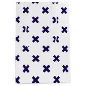 Blauwe marineschijven op witte medium cadeauzakje (Voorkant)