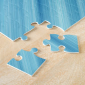 Blauwe metalen achtergrond legpuzzel (Zijkant)