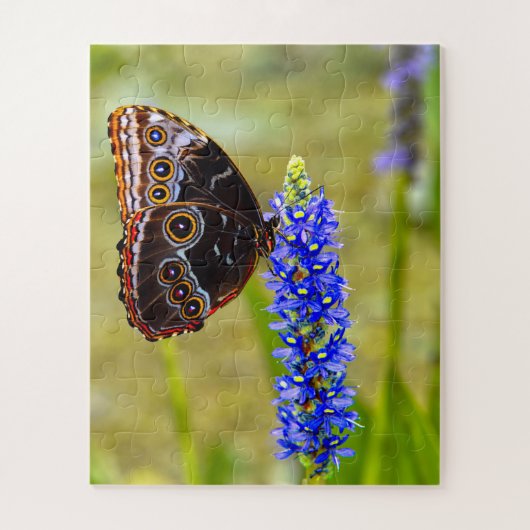 Blauwe morpho vlinder op een moeras orchidee legpuzzel (Verticaal)