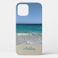 Blauwe oceaan golven op een Caribisch strand V2