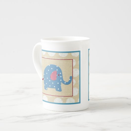 Blauwe olifant met witte pooldots porselein kop (Links)