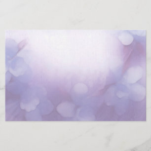 Blauwe orchideeën en kant briefpapier
