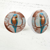 Blauwe papegaai op koperen tak keramische knop