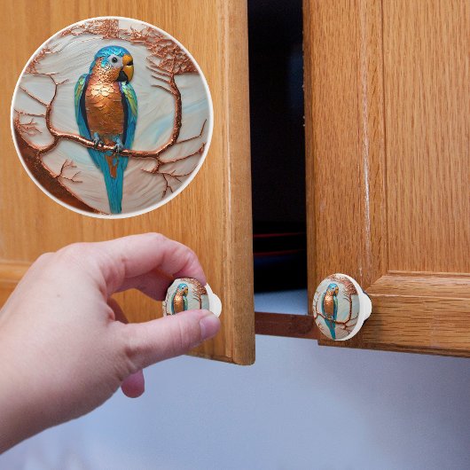 Blauwe papegaai op koperen tak keramische knop