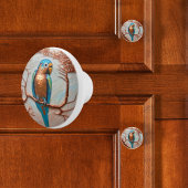 Blauwe papegaai op koperen tak keramische knop