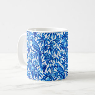 Blauwe papegaaien in een tropische tuin koffiemok