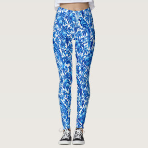 Blauwe papegaaien in een tropische tuin leggings