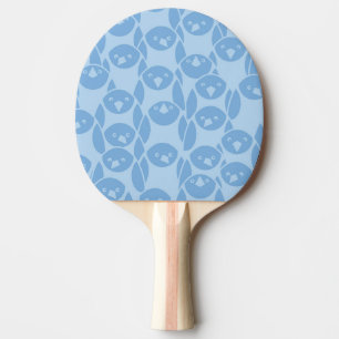Blauwe pinguïnpatroonachtergrond tafeltennisbatje
