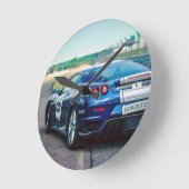 Blauwe racewagen ronde klok (Hoek)