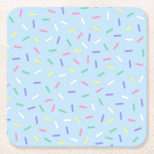 Blauwe regenboog strooit confetti leuk kleurrijk kartonnen onderzetters (Voorkant)