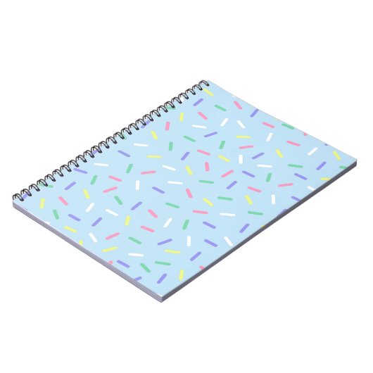 Blauwe regenboog strooit confetti leuk kleurrijk notitieboek (Linkerzijde)