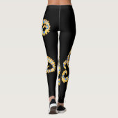 Blauwe ringstonk op zwart leggings (Achterkant)