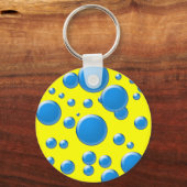 Blauwe rondjes op geel sleutelhanger (Voorkant)