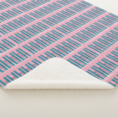 Blauwe ski's op roze deken (3/4)