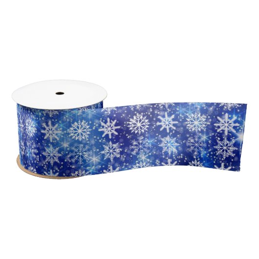 Blauwe sneeuw die sneeuwvlokken herhaalt satijnen lint (Spoel)
