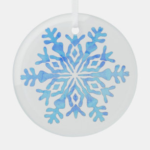 Blauwe sneeuwvlok ontwerp op een glazen ornament