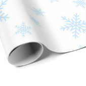 Blauwe sneeuwvlokken in het wit cadeaupapier (Rol Hoek)