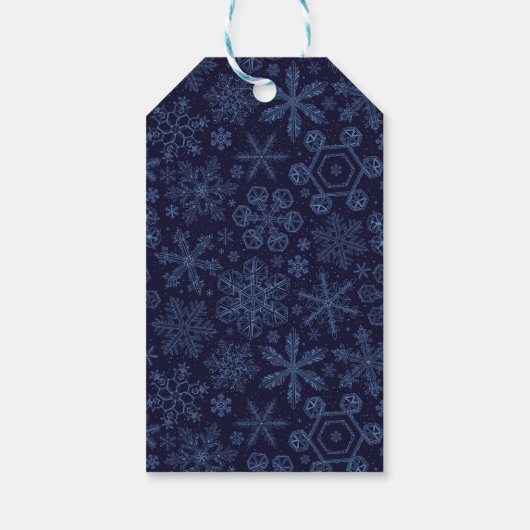 Blauwe sneeuwvlokken op blauw cadeaulabel (Achterkant)