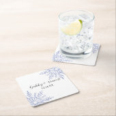 Blauwe sneeuwvlokken op het witte winterhuwelijk kartonnen onderzetters (Insitu)