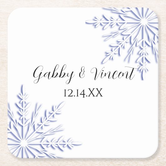 Blauwe sneeuwvlokken op het witte winterhuwelijk kartonnen onderzetters (Voorkant)