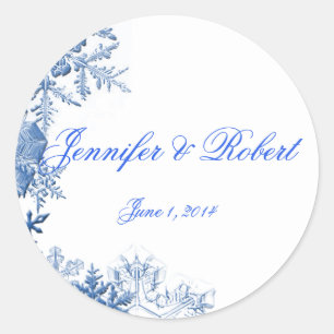 Blauwe sneeuwvlokken op witte achtergrond ronde sticker