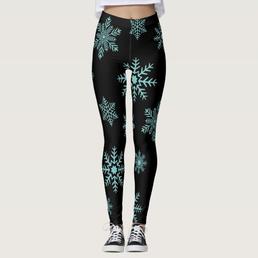 Blauwe sneeuwvlokken op zwarte Leggings (Voorkant)