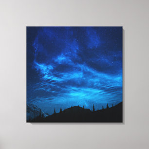 BLAUWE STARTEN IN EEN DARK EN BLAUWE SKY CANVAS AFDRUK