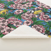 Blauwe stietvogels in de bloeiende kersenboom op b sherpa deken (3/4)