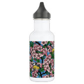 Blauwe stietvogels in de bloeiende kersenboom op b waterfles  (Links)