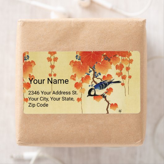 Blauwe tiervogel, Paulownia tak, rode herfstblader Etiket (Insitu)