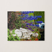 Blauwe tuin van delfinebloem en godin-beeld legpuzzel (Horizontaal)