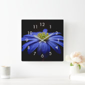 Blauwe ventilator foto op zwarte wandklok (Huis)