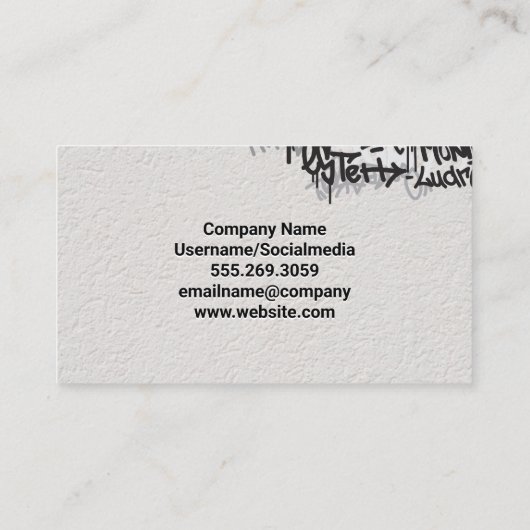 Blauwe verf over graffiti visitekaartje (Achterkant)