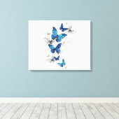 Blauwe Vliegende Vlinders Morpho Canvas Afdruk (Insitu (Houten vloer))