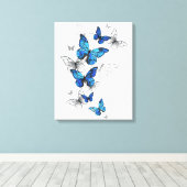 Blauwe Vliegende Vlinders Morpho Canvas Afdruk (Insitu (Houten vloer))