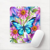 Blauwe vlinder in een gebied met bloemen muismat (Met muis)