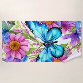 Blauwe vlinder in een gebied met bloemen strandlaken (Voorkant)