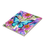 Blauwe vlinder in een gebied met bloemen tegeltje (Zijkant)