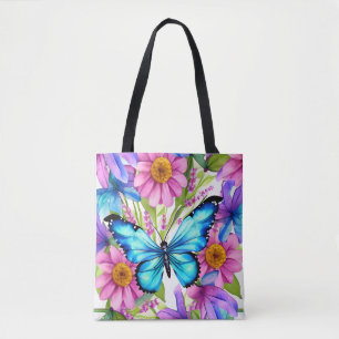Blauwe vlinder in een gebied met bloemen tote bag