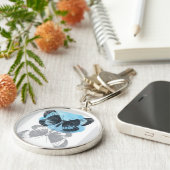 Blauwe vlinder magie. sleutelhanger (Zijkant)