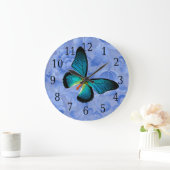 Blauwe vlinder op blauwe bloemen klok (Huis)