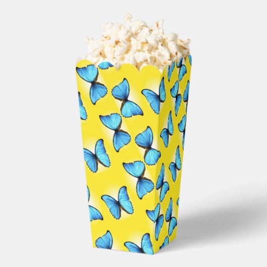 Blauwe vlinders op geel bedankdoosjes (Popped)