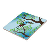 Blauwe vogel in bomen tegeltje (Zijkant)