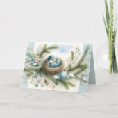 Blauwe vogelnest met versiering in winterdennenbom feestdagen kaart (Voorkant)