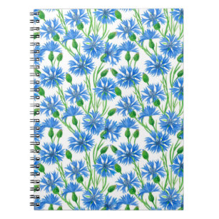 Blauwe waterverf cornbloemen, wilde bloemen op wit notitieboek