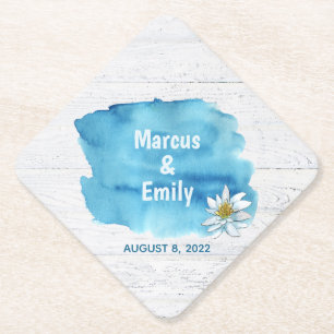 blauwe waterverf spatten op hout met waterlans kartonnen onderzetters