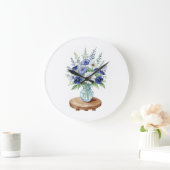 Blauwe Wildbloemen in een vasmuur klok (Huis)