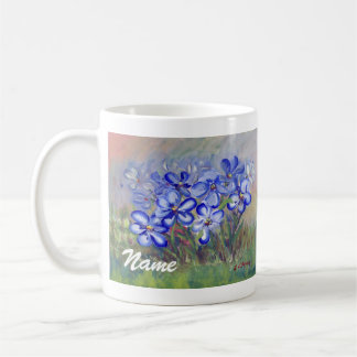 Blauwe wilde bloemen in een veldeffectschildering koffiemok