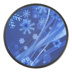 Blauwe wintersneeuwkerst hockey puck